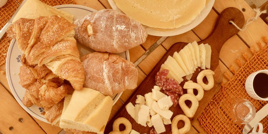 A table topped with lots of different types of food