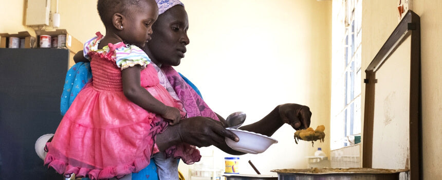 A warm meal for a malnourished child in Nairobi