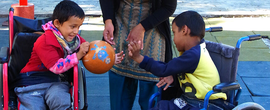 A physiotherapy session for a child with disabilities in Nepal