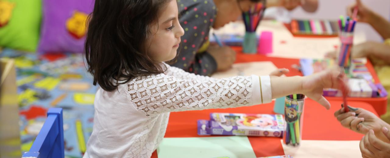 Four minutes of art and trauma therapy for a child in Iraq