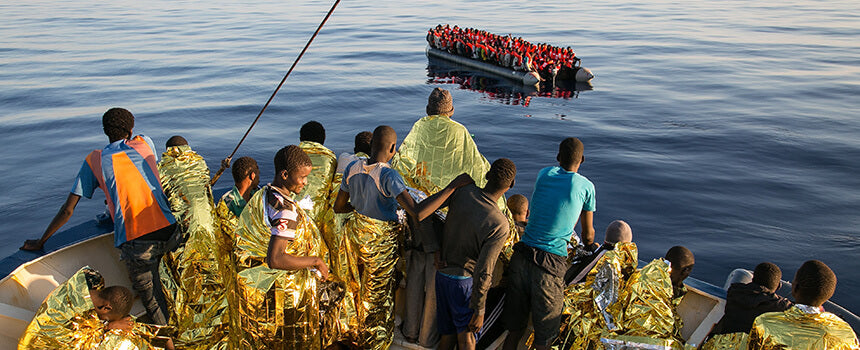 Four bottles of water for refugees in distress at sea